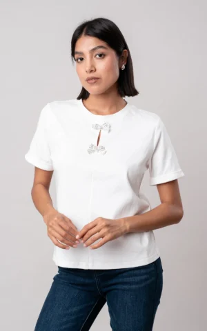 playera con moños pedrería