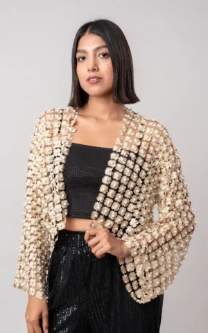 suéter con perlas